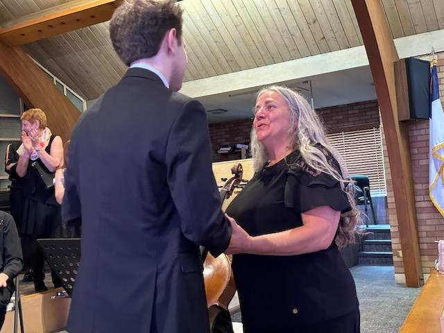 Taylor presenting Brenda with FCC's Apex Award (Spring 2024)