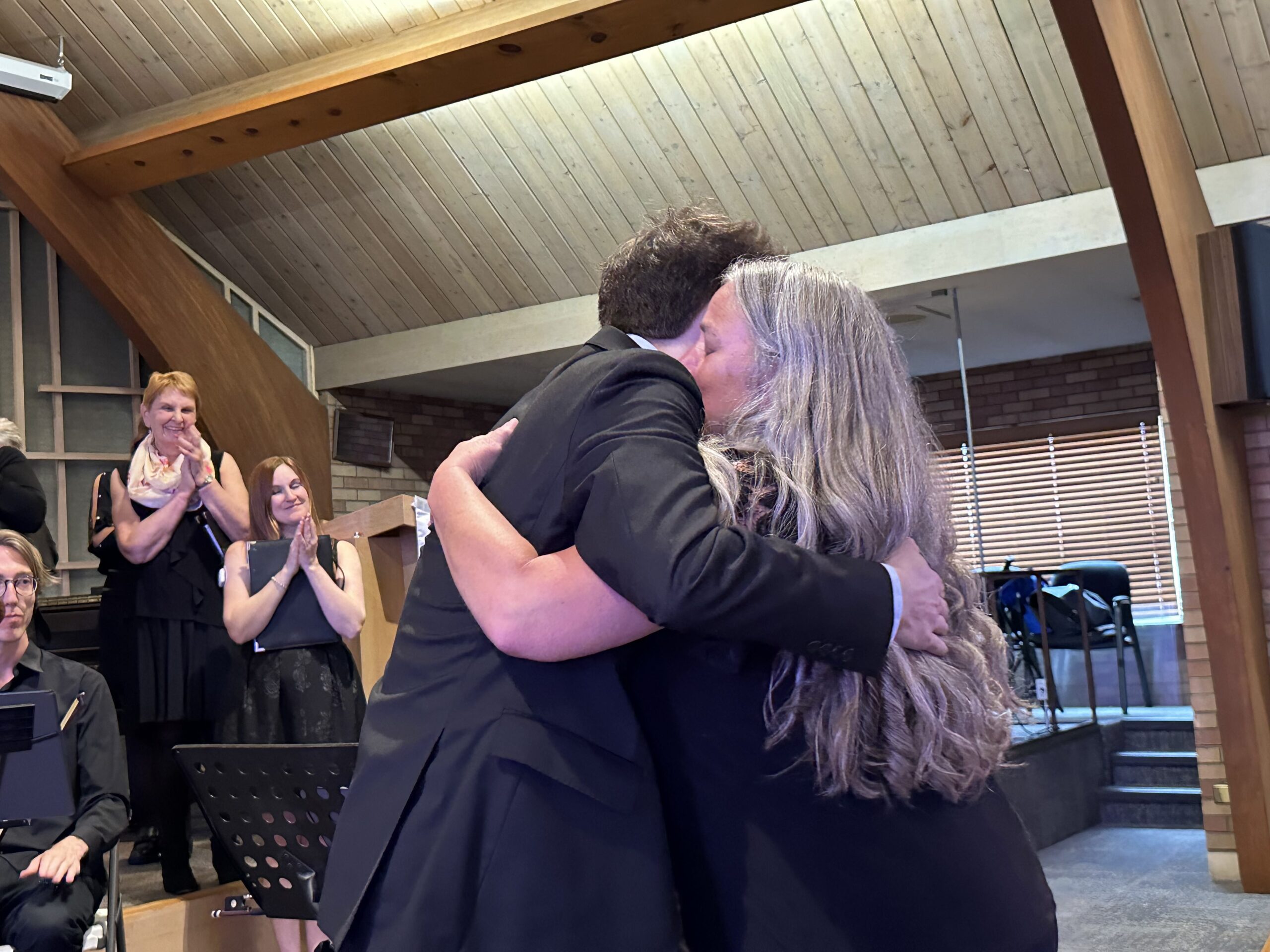 Taylor presenting Brenda with FCC's Apex Award (Spring 2024)